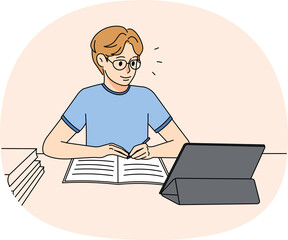 Guy in glasses study online on pad