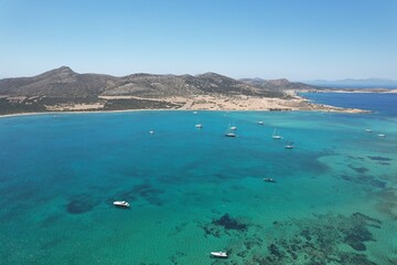 Naklejka premium Aerial views from over the Greek Island of Antiparos, looking out towards the adjacent island of Despotiko