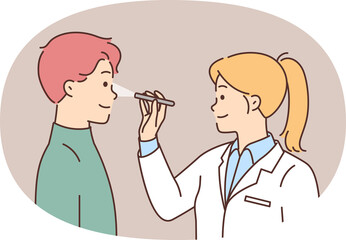 Female doctor examine male patient sight