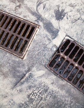 Drain grates on the road.