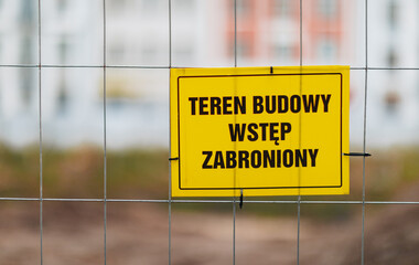 Yellow warning sign with the words 