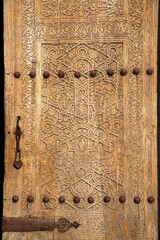 A fragment of an old carved door, Ichan-Kala. Khiva, Uzbekistan