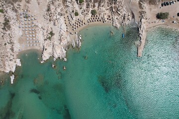 Aerial views from over Kolympethres Beach on the Greek Island of Paros. 