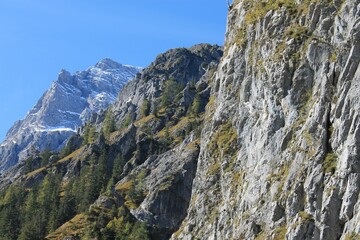 Fototapeta na wymiar Rock wall in front of mountain