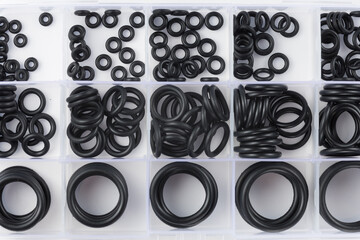 Set of rubber rings for plumbing. - obrazy, fototapety, plakaty