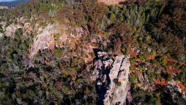 Aerial lookdown over rocks in Australian bushland in Paradise Park, Murrurundi