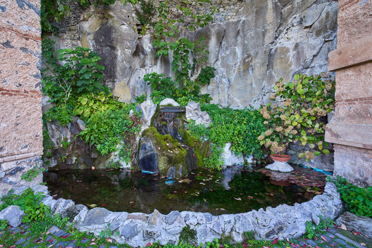 Fountain on a walking path at the village of Nemi, Castelli Romani, Rome, Italy
