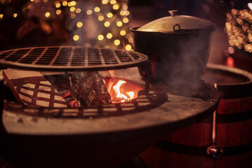 christmas street food, mulled wine cauldron at the street