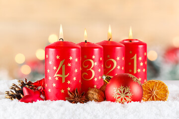 Fourth 4th Sunday in advent with burning candle Christmas time decoration with copyspace copy space