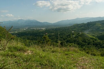 Scenic view of a beautiful landscape filled with valleys and mountains seen on a sunny day