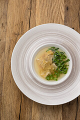 soup with pasta and herbs. Close-up