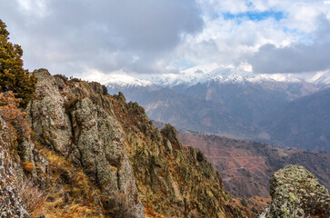Fototapeta na wymiar snow covered peaks of Chatkal ridge scenic view from Amirsoy mountain (Tashkent region, Uzbekistan)