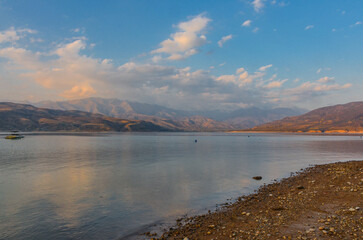 scenic view of Charvak Lake in Tian Shan mountains at sunset (Yusufhona, Tashkent region, Uzbekistan)