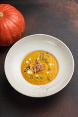 Pumpkin puree soup. Close up