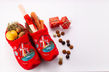 Dutch children shoes filled with treats, traditional sweets pepernoten for St Nicholas Day