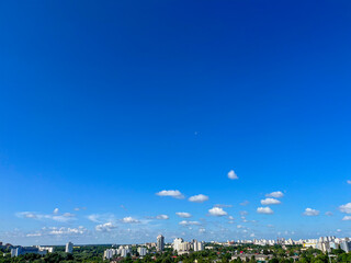 there are soft fluffy clouds in the sky