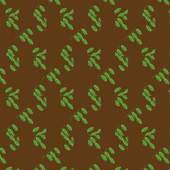 Seamless Pattern of green leaves on brown background