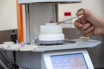 Crowns oven with crown on gypsum holder with humans to prevent heat burns using holder