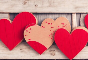 hearts on wooden background