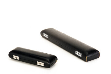 Cases for flutes, wind musical instrument on white background with space for your text or design