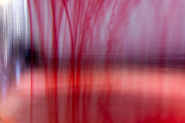 abstract red diffusion pattern in water