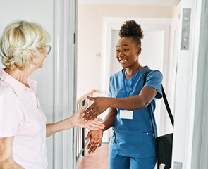 nurse senior home care patient elderly caregiver door welcome greeting front door house house call...