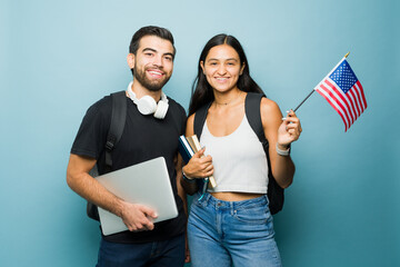 Portrait of mexican woman and man student learning English in college