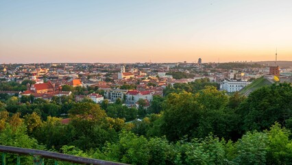 Obraz premium View to the old town with green trees at daytime in Vilnius, Lithuania