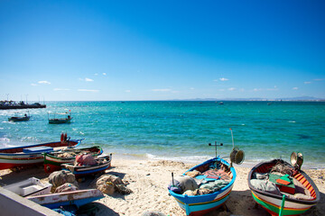 Hammamet Tunisia, Beach and  boats on shallow water, view on Mediterranean sea 