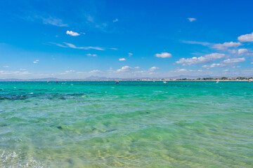 Hammamet Tunisia, Beach and  boats on shallow water, view on Mediterranean sea 