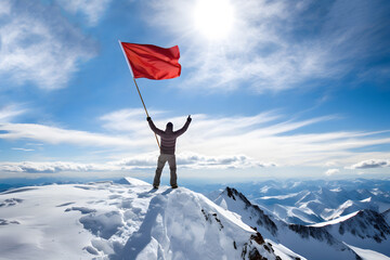 Man on top of a mountain peak covered in white snow, holding a big red flag waving in the wind, standing with arms raised up and his finger pointing to the azure sky and the shining sun - obrazy, fototapety, plakaty