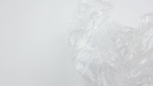 Transparent plastic on a white background, plastic packaging