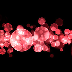 Glowing abstract background, red shiny circle bokeh lights over the black background - 676968099
