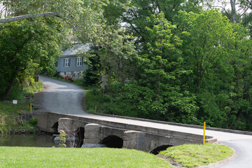 Fototapeta na wymiar One lane concrete bridge crossing the Stony creek