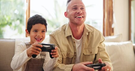 Video game, happy and father with child on a sofa for gaming, playing and console competition at home together. Esports, gamer and family in a living room excited, fun and bond in vacation freedom - Powered by Adobe