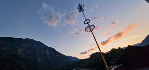 A maypole is a tall wooden pole erected as a part of various European folk festivals, around which...