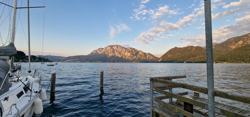 enchanting beauty of Traunkirchen am Traunsee, a picturesque village nestled on the shores of the stunning Traunsee lake in Austria. The village exudes a charming atmosphere with its historic architec