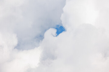 white cumulus clouds in blue sky, beautiful view of the sky and storm clouds. Huge majestic cloud phenomena. nature atmosphere ecology weather. Storm warning, weather change before storm thunderstorm