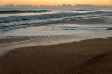 Crashing waves at sunrise on Florida beach
