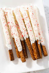 Candy cane chocolate covered pretzel rods