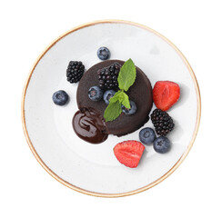 Plate with delicious chocolate fondant, berries and mint isolated on white, top view