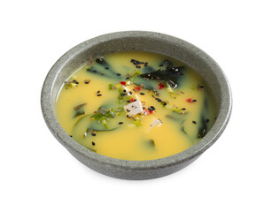 Bowl of delicious miso soup with tofu isolated on white