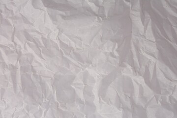 Texture of crumpled parchment paper as background, top view