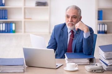 Old male employee and too much work at workplace