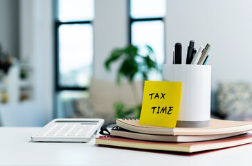 Tax time sticker on office desk