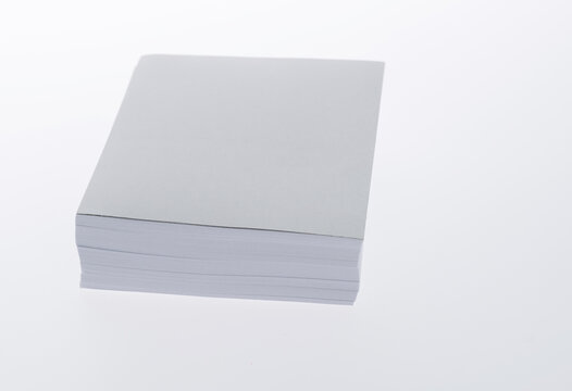 Stack white paper on white background