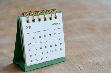 January 2024 table calendar with customizable space for text. Calendar and copy space concepts
