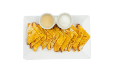 Bread coated with eggs, milk and sugar