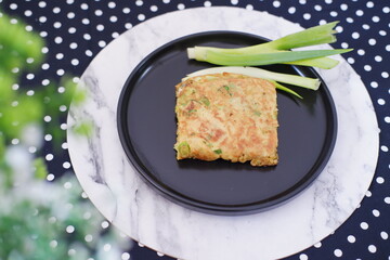 Martabak Telor or Martabak Telur. Savory pan-fried pastry stuffed with egg, meat and spices.