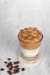 Dalgona coffee, Iced fluffy creamy whipped trend drink with coffee foam and milk